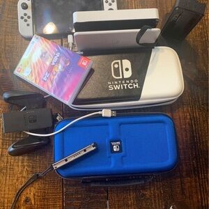 Nintendo switch game system two cases coby Bryant game and accessories all new